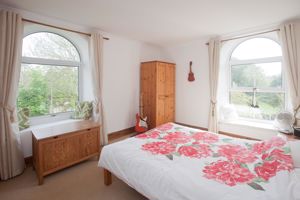 Bedroom One- click for photo gallery